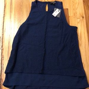 The limited blue tank top